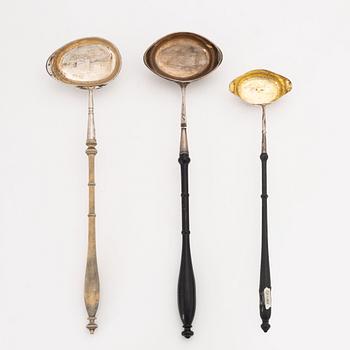 A set of three silver ladles, earlt 19th Century.