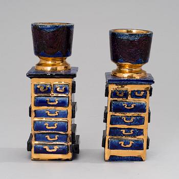 BIRGER KAIPIAINEN, A PAIR OF CANDLESTICKS. One signed Kaipiainen.