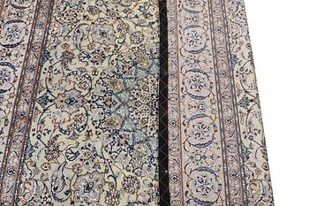 A Nain carpet, part silk, 6 laa, c. 283 x 180 cm.