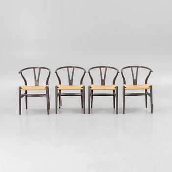 Hans J. Wegner, four CH 24 chairs, Carl Hansen & Son, Denmark.