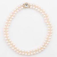 Pearl necklace, double-stranded with cultured freshwater pearls, clasp 18K gold set with aquamarine and cultured pearls, Jarl Sandin.