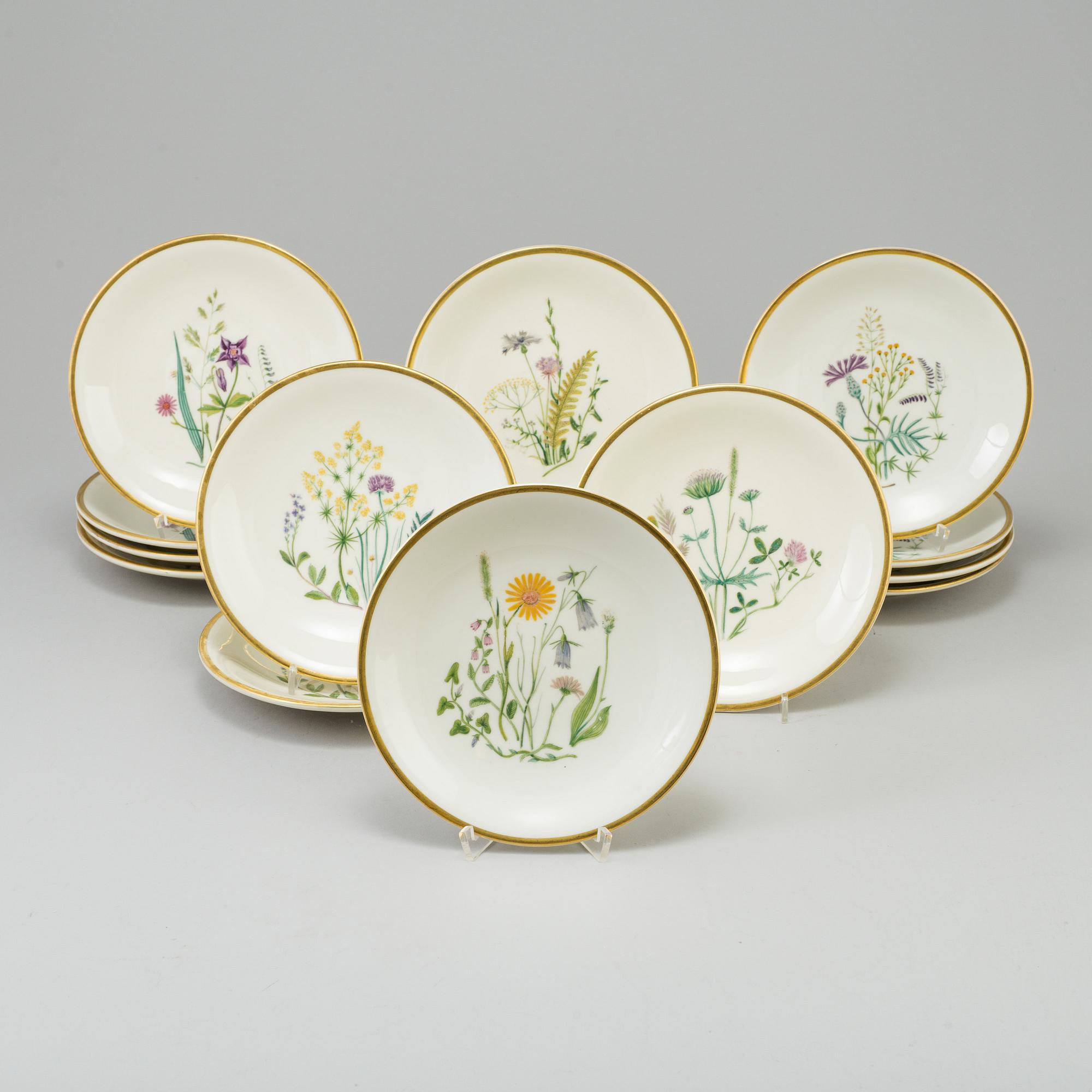 A set of 15 porcelain plates from Nordiska Kompaniet, first half 20th century.