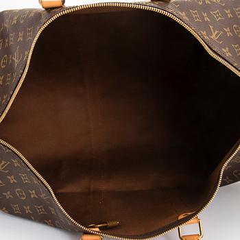 Louis Vuitton, a Monogram Canvas 'Keepall 55' bag.