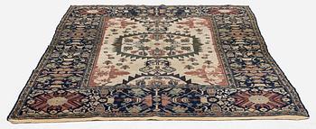 An antique Malajir rug, c. 179,5 x 124 cm (as well as one end with 2.5 cm flat weave).