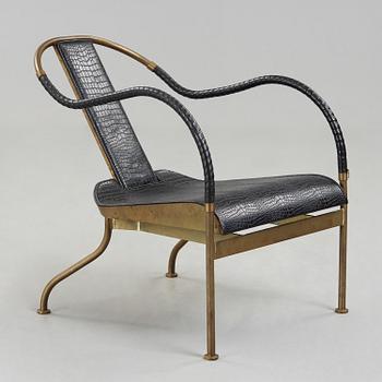 A Mats Theselius brass and black leather 'El Rey' easy chair, Källemo, Sweden 1999.