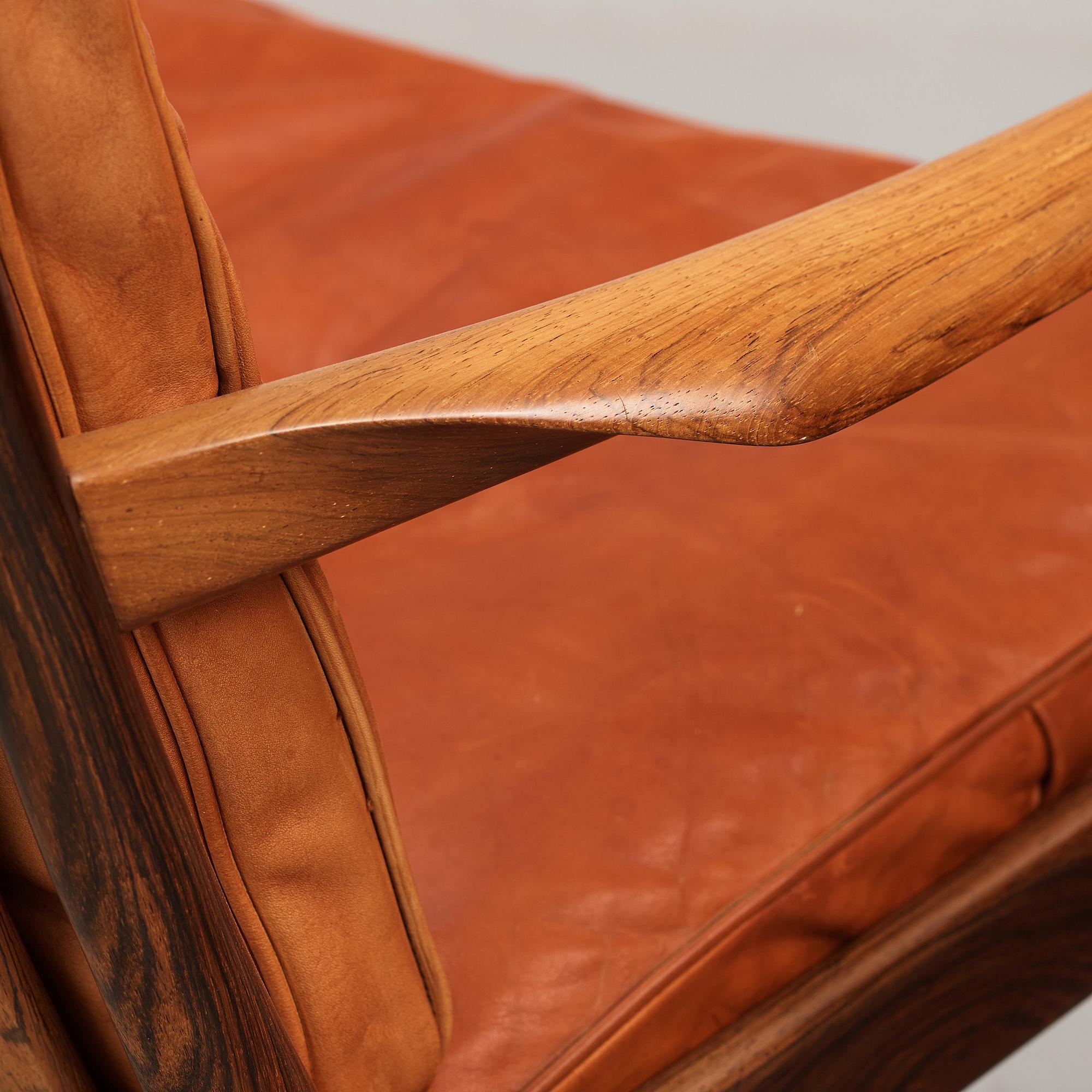 Ib Kofod-Larsen, a pair of "Samsö" palisander and brown leather easy chairs, Olof Persons Fåtöljindustri (OPE) Sweden 1960's.
