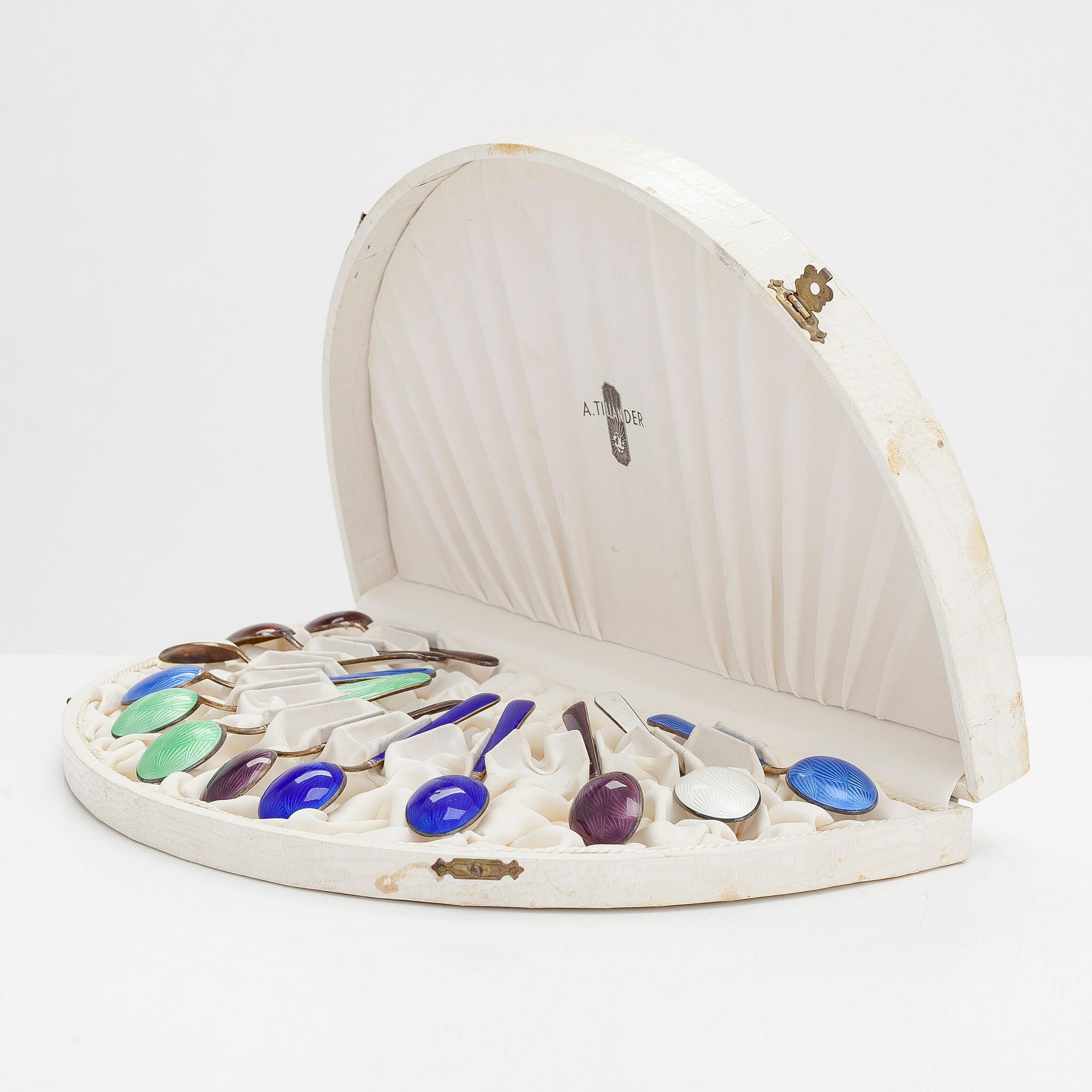 Tillander, sixteen enamelled and gilded silver coffee spoons, Helsinki 1952-65. Twelve in original box.