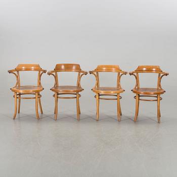 A set of four Cosmos arm chairs first half of the 20th century.