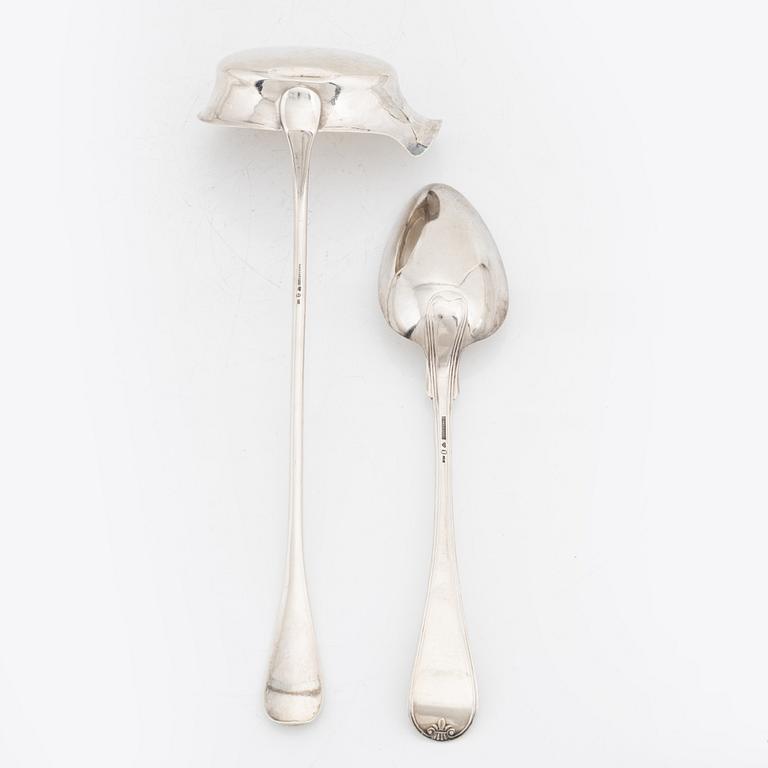 A Swedish silver serving spoon and ladle, marks of A Lundqvist, Stockholm 1842 and A Ambrosius, silver, Stockholm 1884.