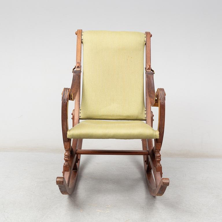 a late 19th century rocking chair.