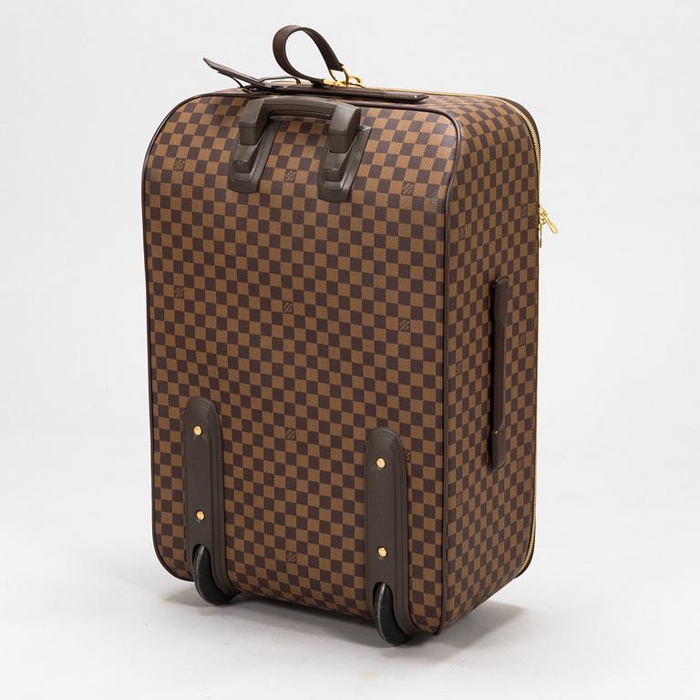 Louis Vuitton, A Damier Ebene 'Pegase 70' luggage.