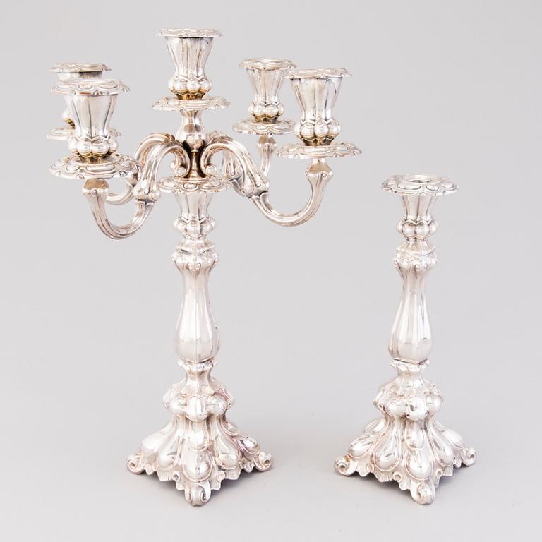 CANDELABRUM AND CANDLESTICK, silver, Kultakeskus Oy, Hämeenlinna, 1965 and 1975.