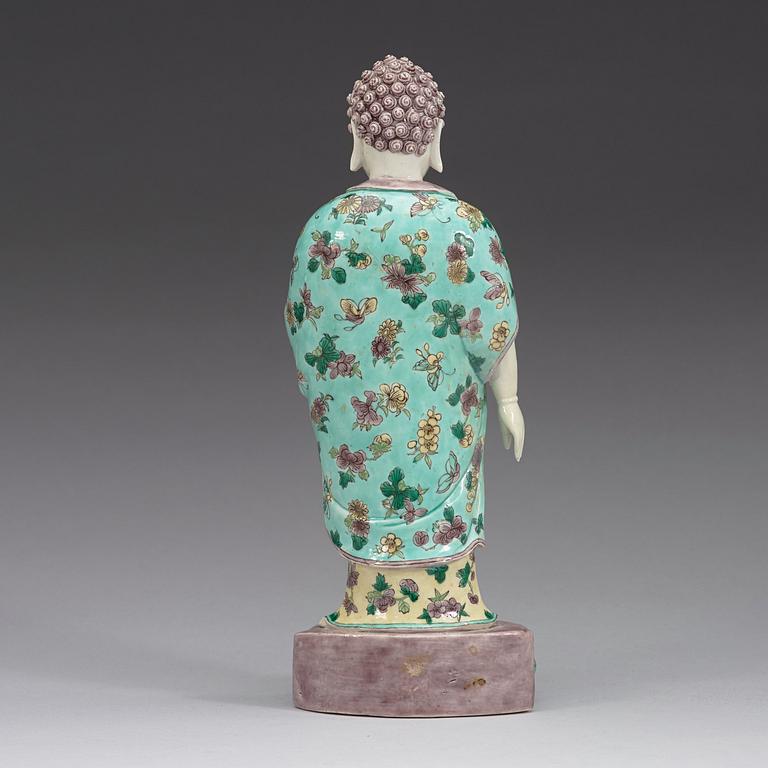 A famille verte figure of a standing Buddha, Qing dynasty, 19th Century.