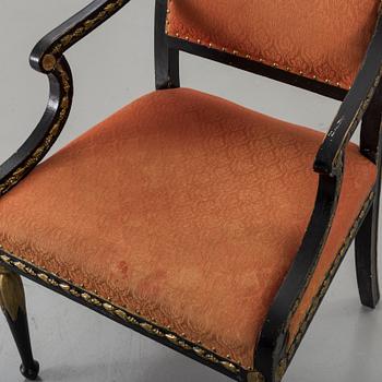 AN EARLY 19TH CENTURY  EMPIRE CHAIR.