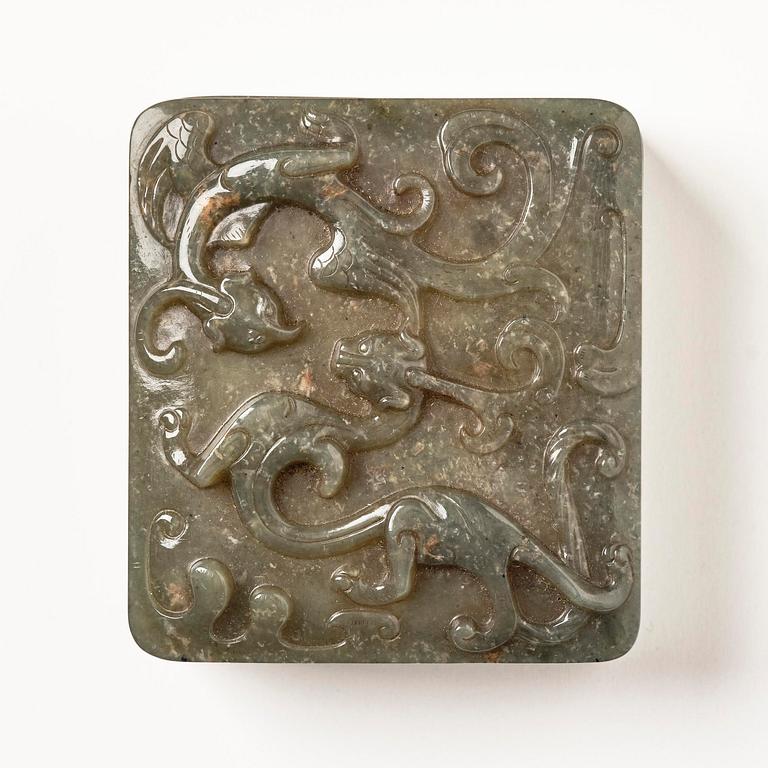 A well carved green stone box with cover, China, 20th century.