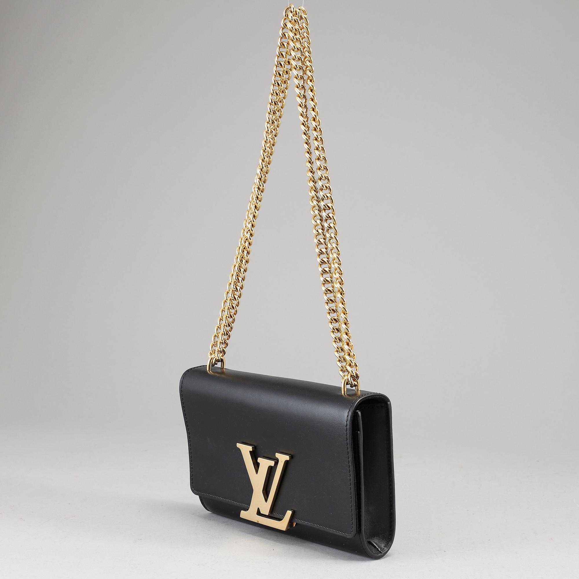 LOUIS VUITTON a black leather Chain Louise MM bag 2015. Bukowskis