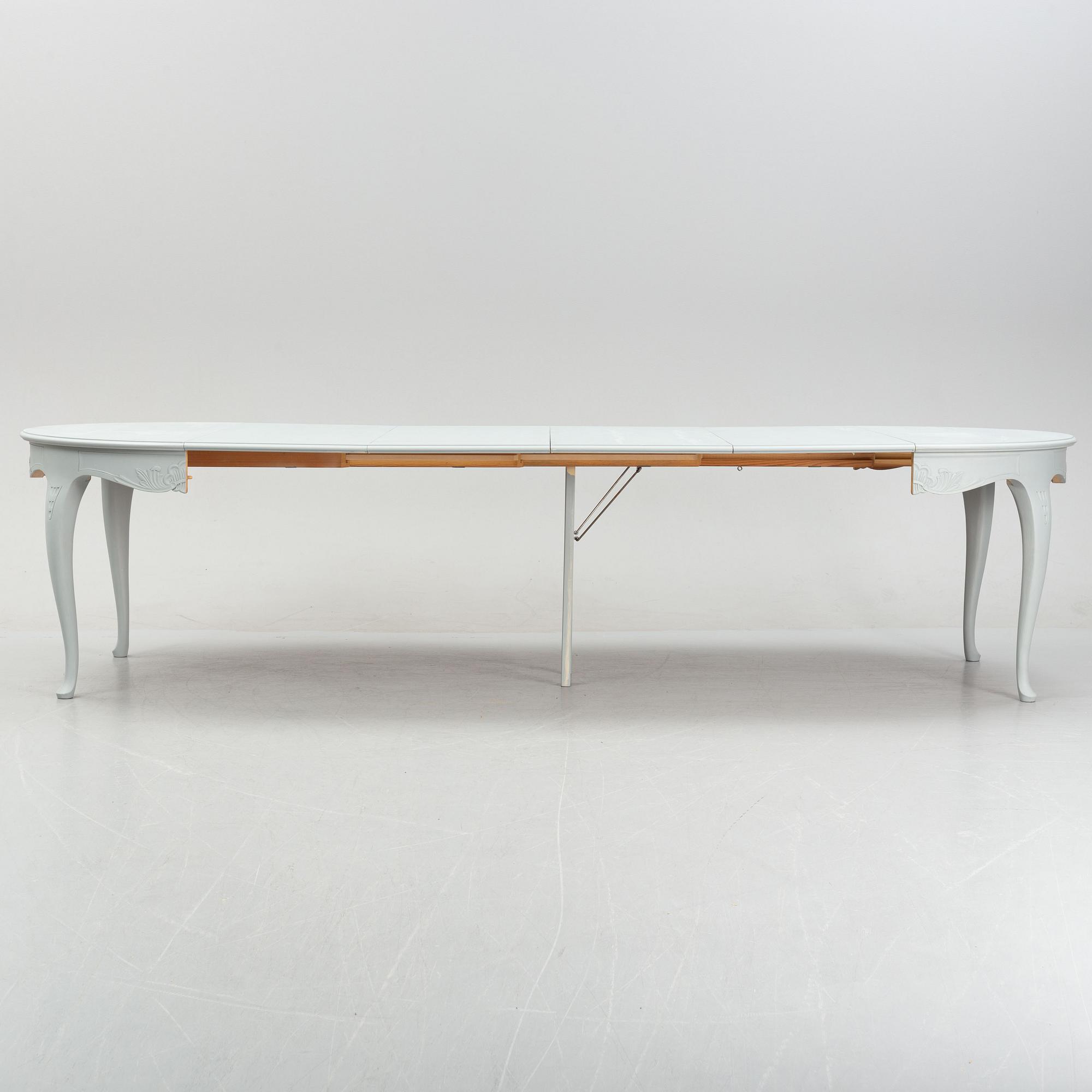 A Rococo style dining table, second half of the 20th Century.