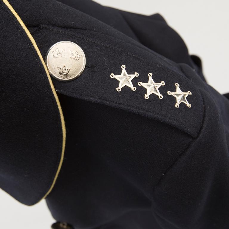a Swedish early 20th Century four piece Swedish military uniform for captain at Svea Livgarde in Stockholm.