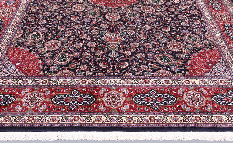 A Kashmar carpet, approx. 406 x 300 cm.