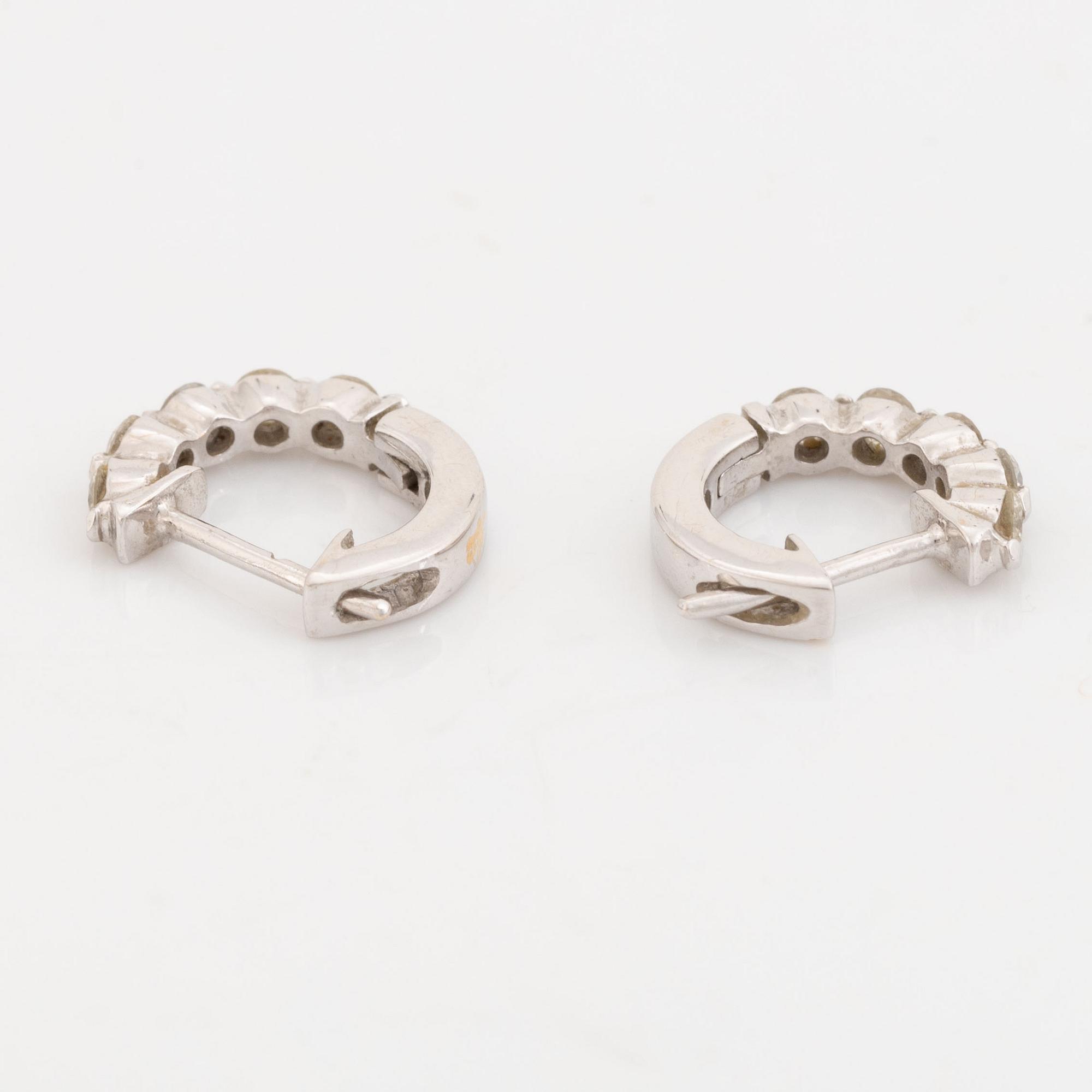 Brilliant cut diamond earrings.