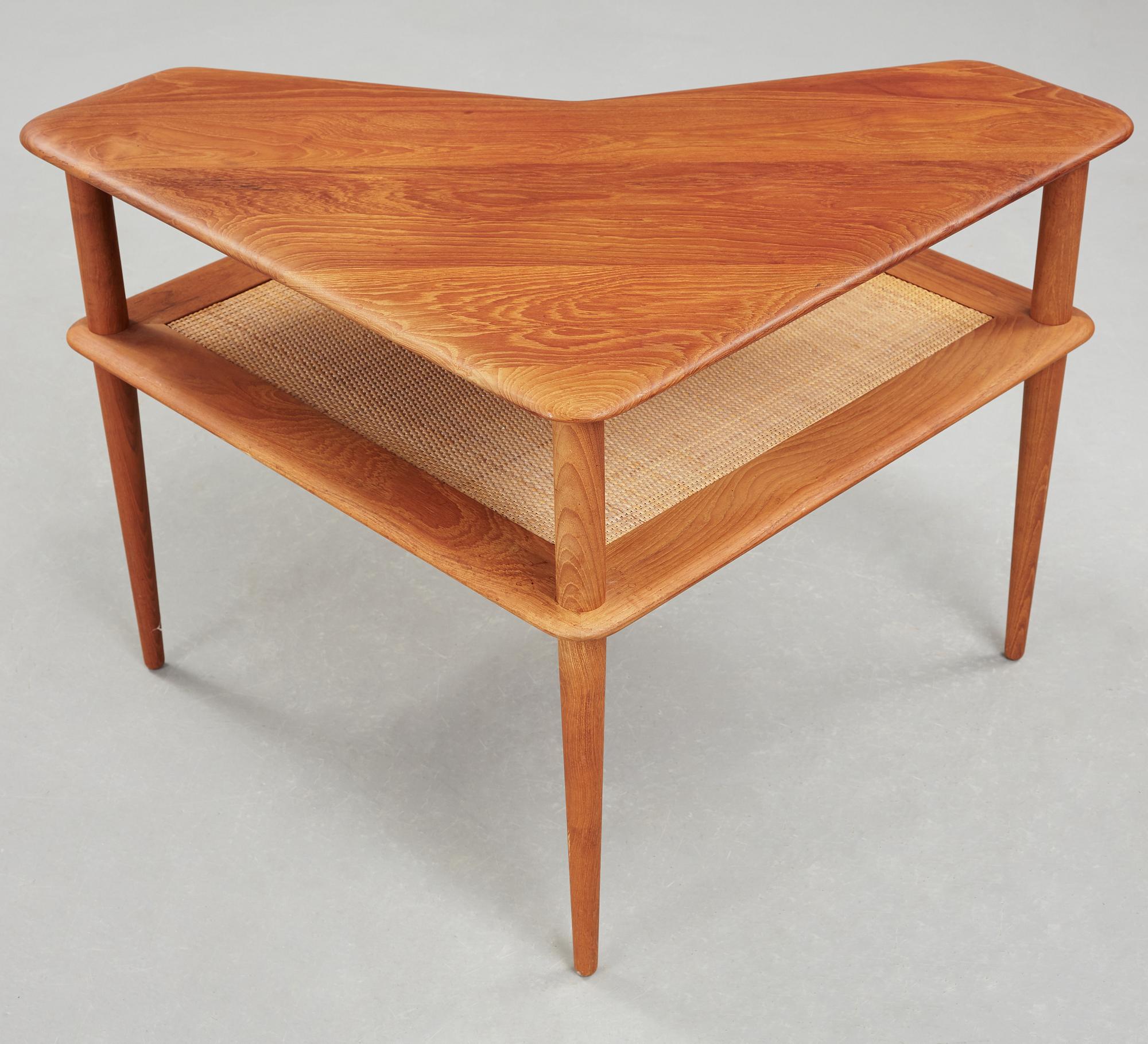 A set of two Danish 'Minerva' sofas with a table for France & Daverkosen.