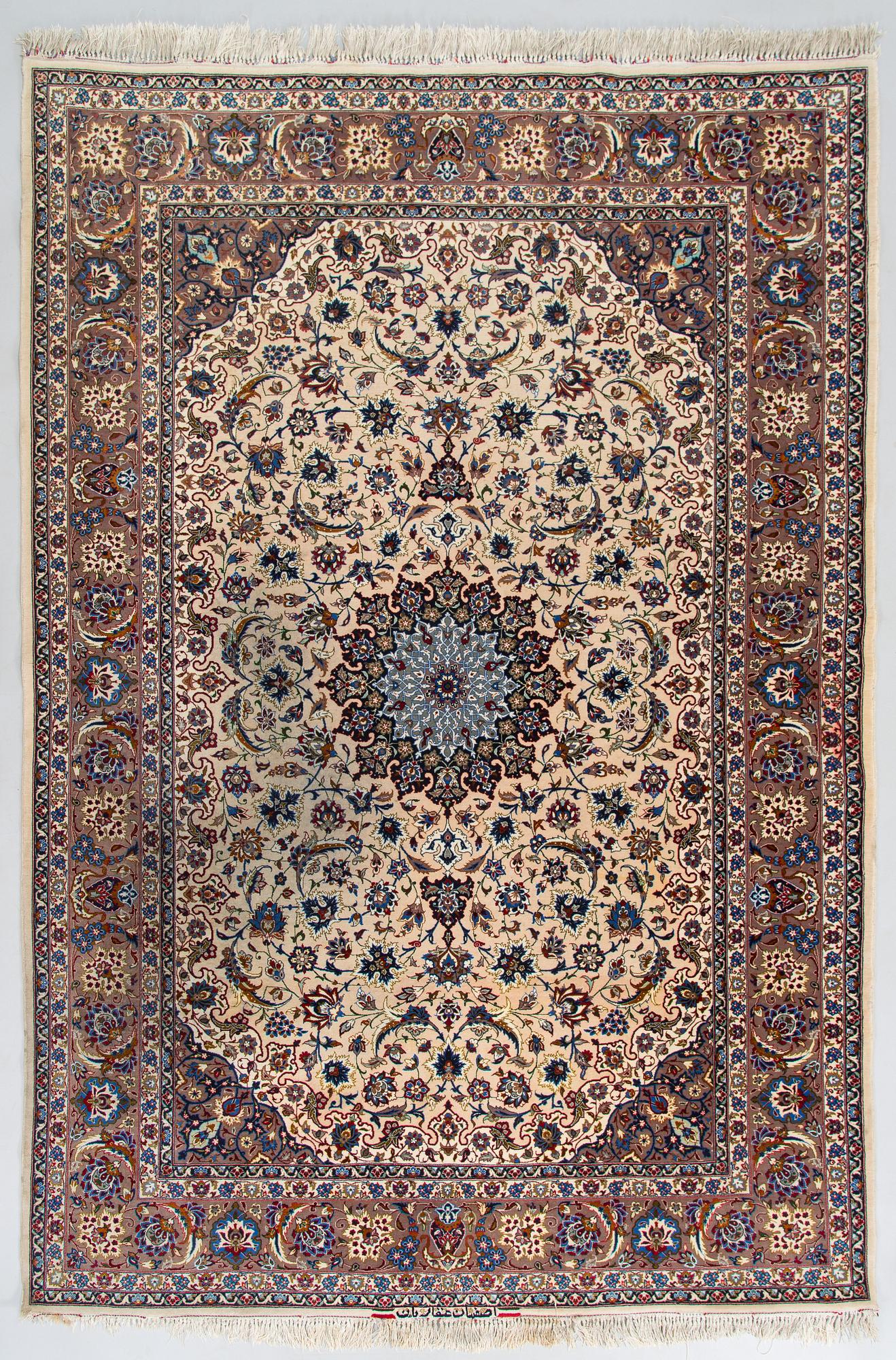 A semi-antique Isfahan rug, central Persia, signed c. 238 x 165 cm.