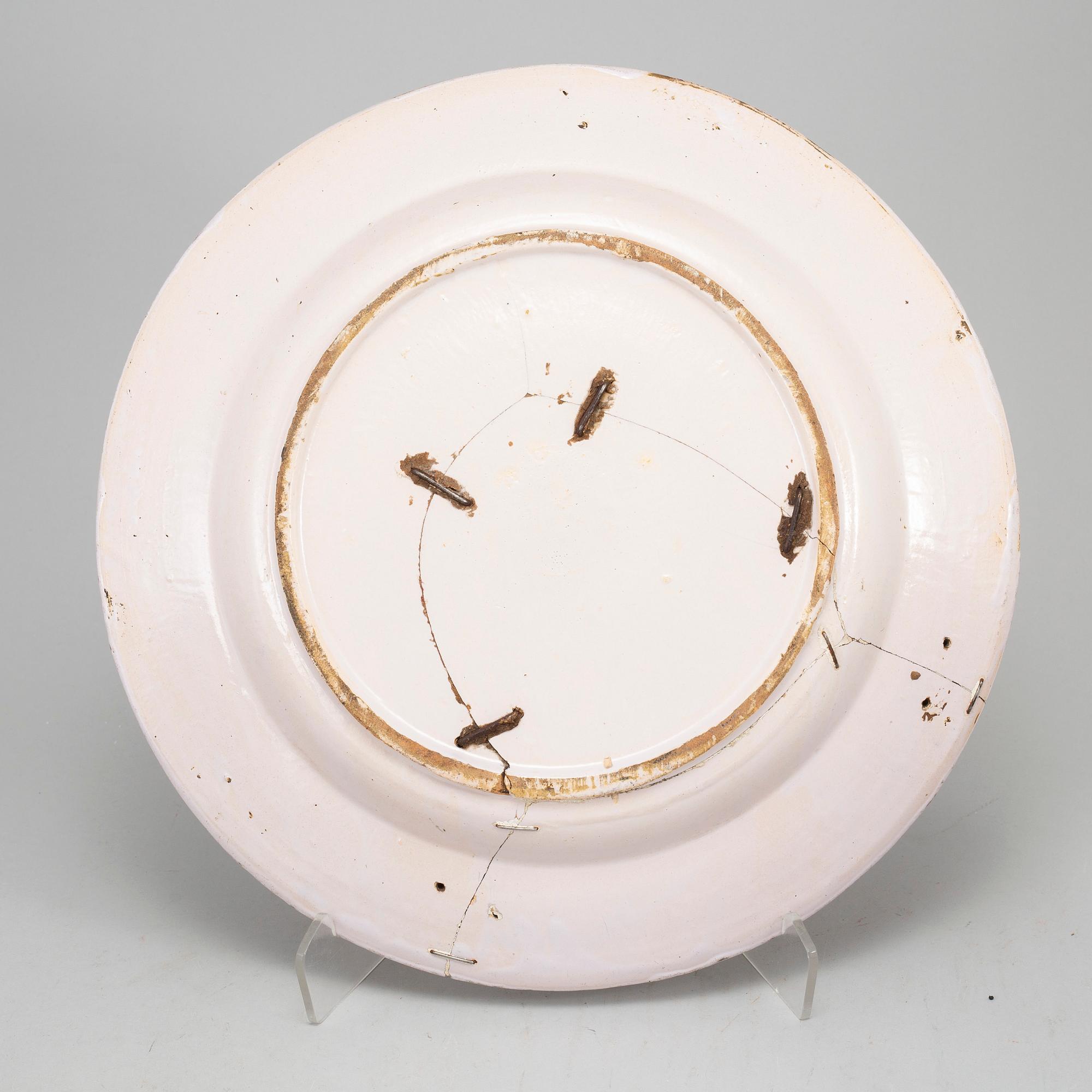 Three faiance dishes, 19th century.