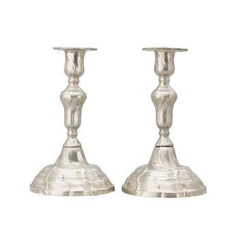 525. A pair of Rococo pewter candlesticks by J. G. Ryman 1794.