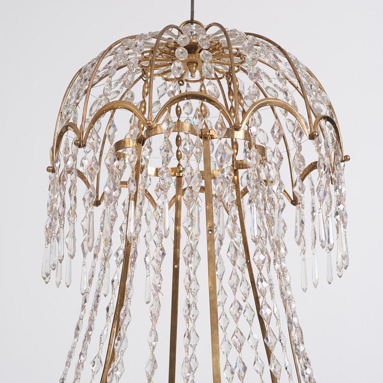 A late Gustavian gilt brass and cut glass thirteen-light chandelier, circa 1800.