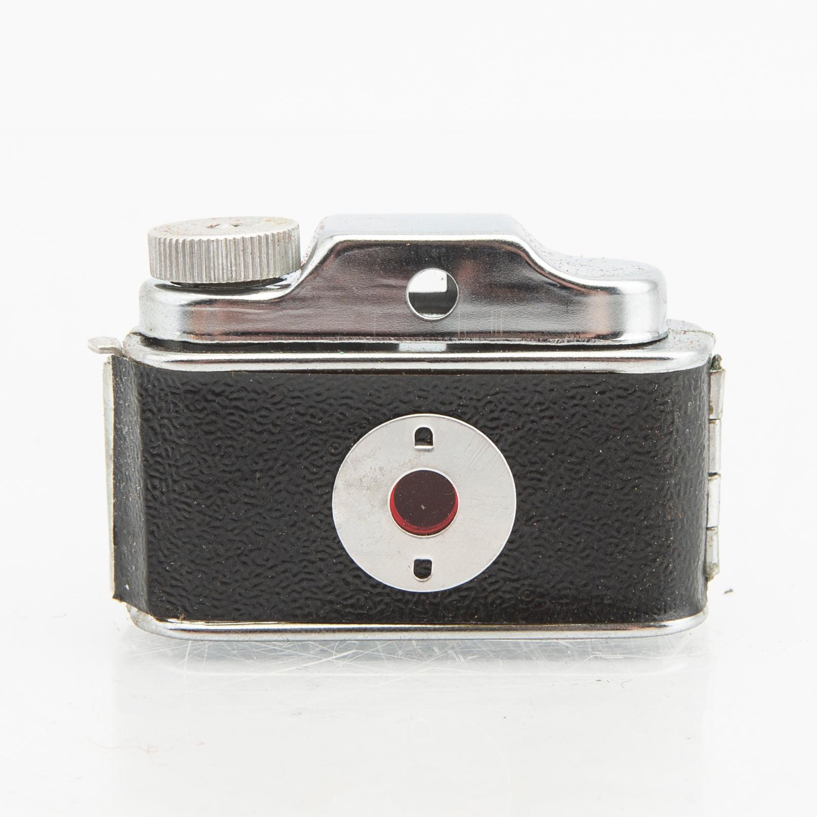 A Japanese 1950s subminiature camera with film.