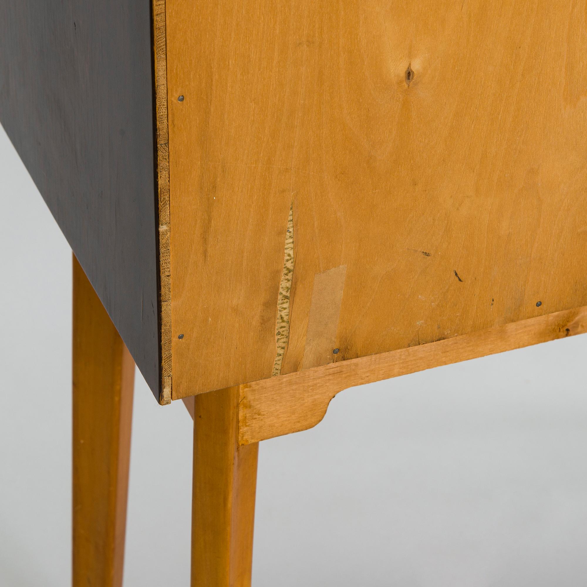 Serving cabinet, "cocktail cabinet" probably manufactured by Oy Boman AB in the 1940s.