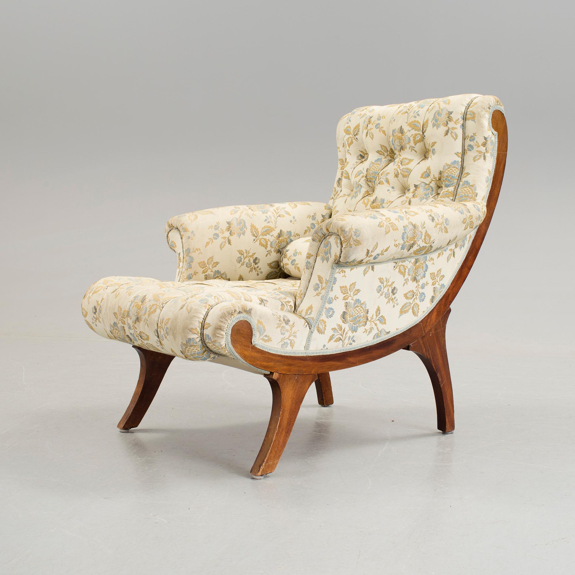 A mahongany recliner chair in the style of Adolf Loos, c. 1900. - Bukowskis