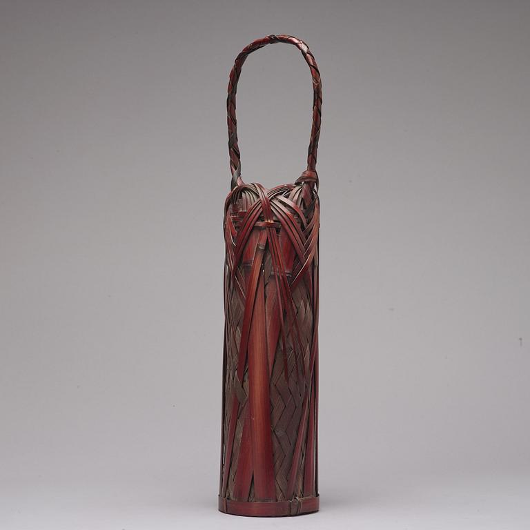 A Japanese tray, miniature pagoda and basket, early 20th Century.