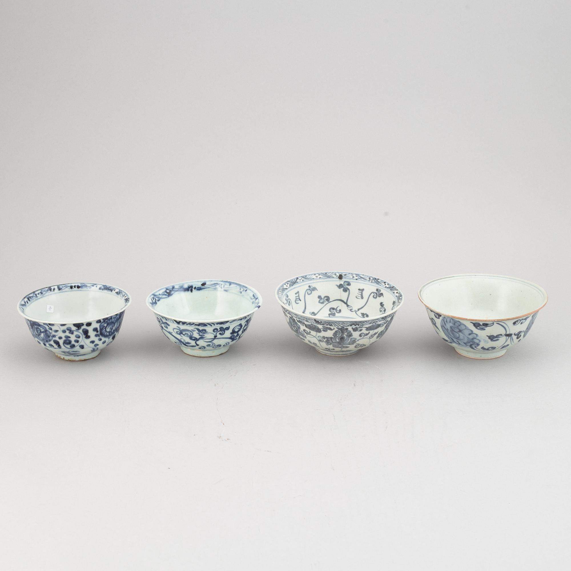 A group of four blue and white bowls, Ming dynasty (1368-1644).