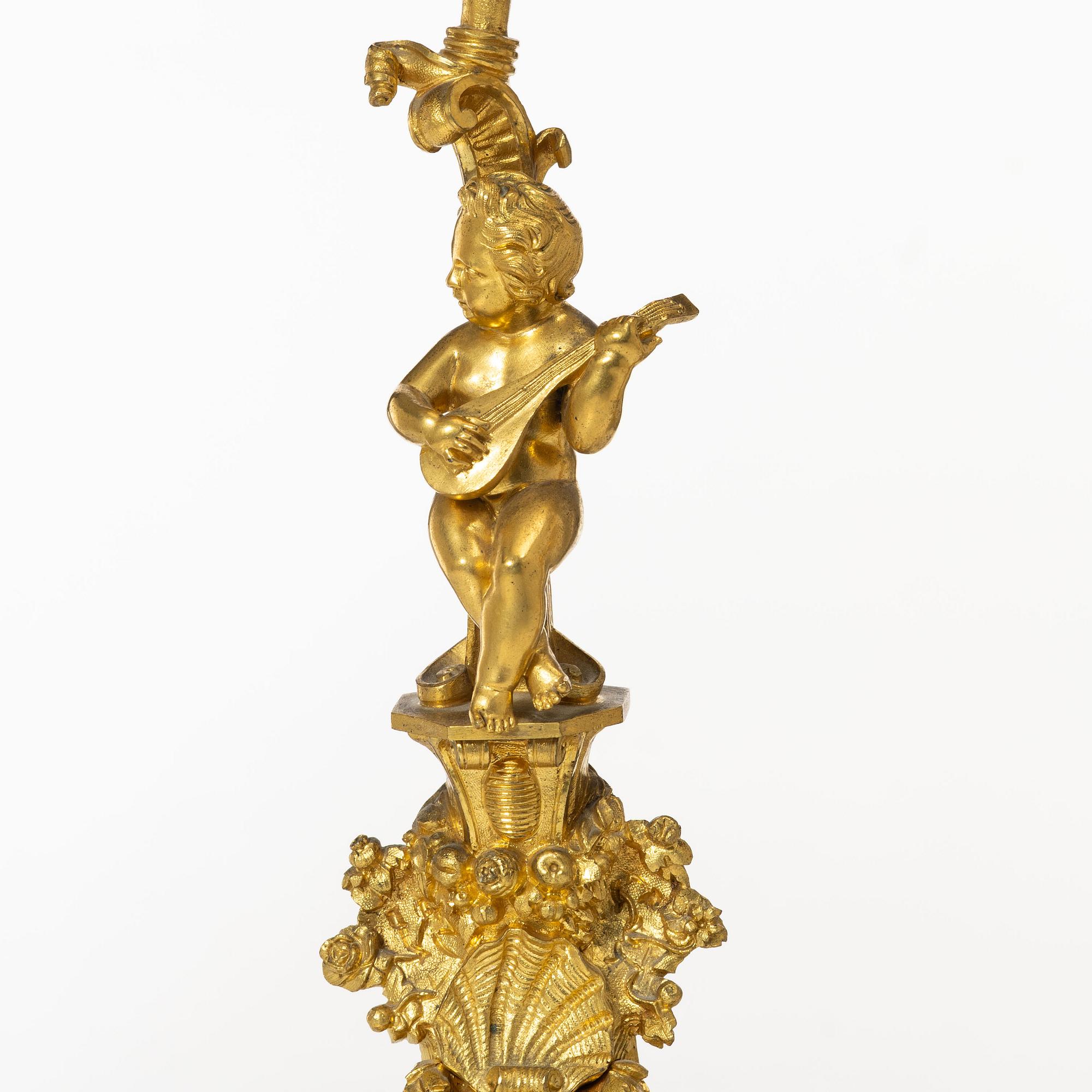 A pair of Louis XV style candelabras, 20th century.