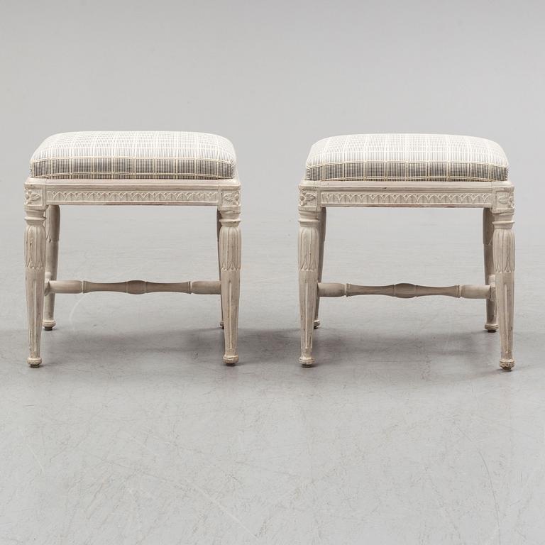 A pair of gustavian late 18th century stools by Erik Öhrmark (master in Stockholm 1777-1813).