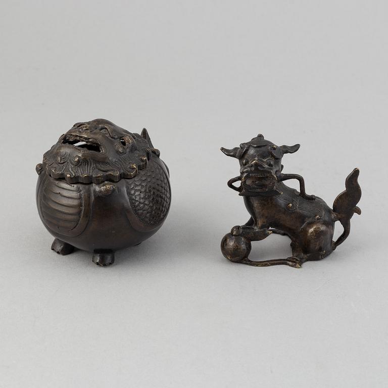 A Chinese bronze vase, figurine and censer, late Qing dynasty.