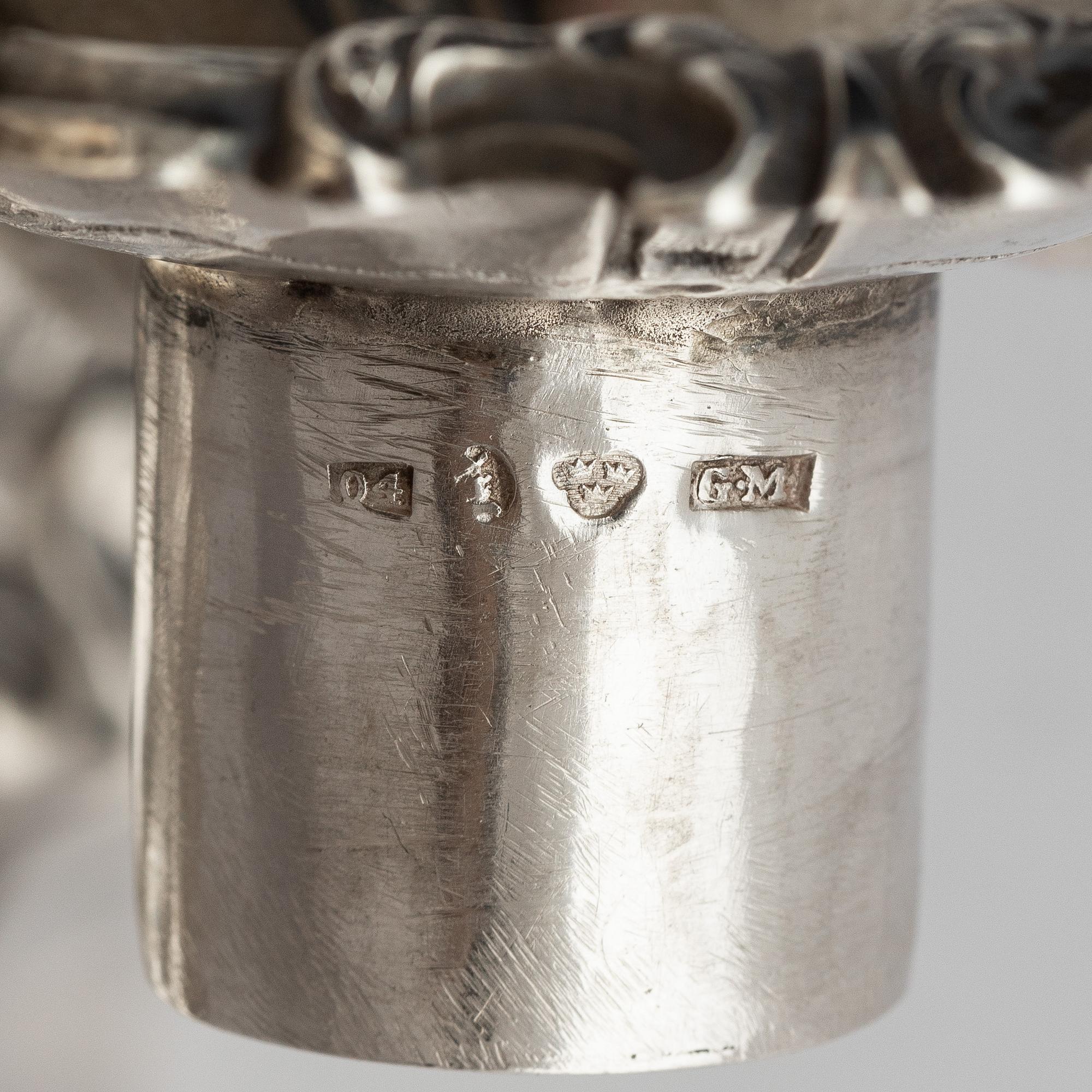 A pair of silver candlesticks, marks Gustaf Möllenborg, Stockholm 1845.