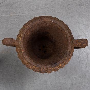 Two 19th century cast iron urns.