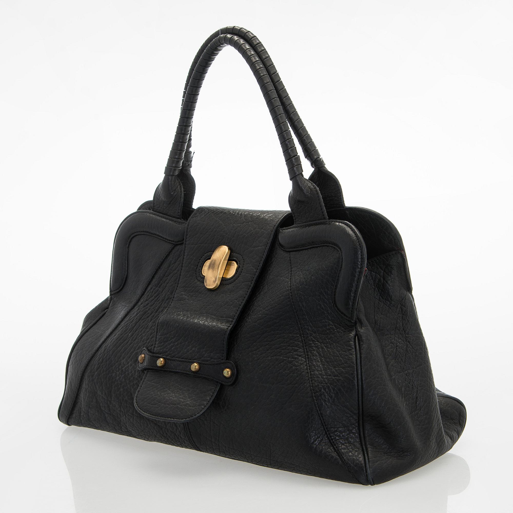 Max Mara, a leather handbag.