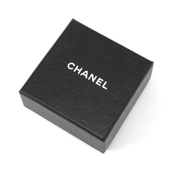 A necklace by Chanel.