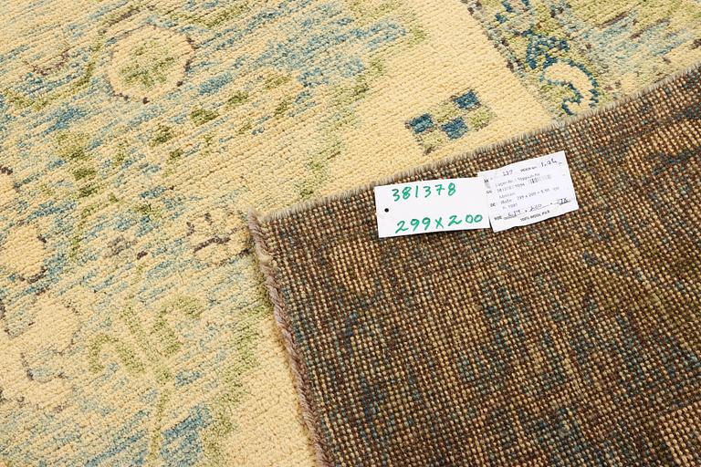 A Kazak carpet, c. 299 x 200 cm.