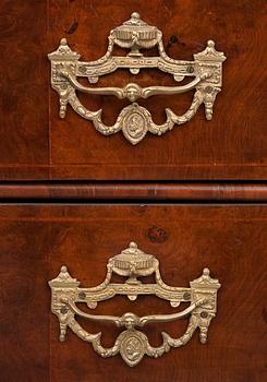 A VITRIN CABINET.