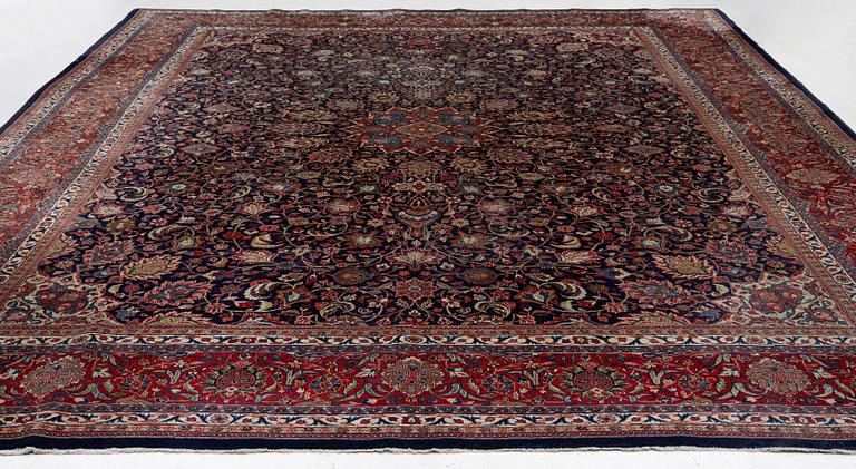A Persian carpet, c. 445 x 320 cm.