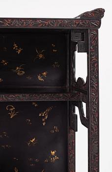 A lacquer display cabinet, late 19th Century.