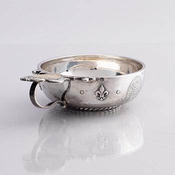 An 18th century French parcel-gilt silver tasse du vin (wine taster).