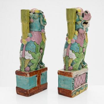 A pair of glazed cramic Fo dogs, Jiaqing (1796-1820), Qing dynasty, China.
