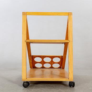 An Italian oak trolley later part of the 20th century.