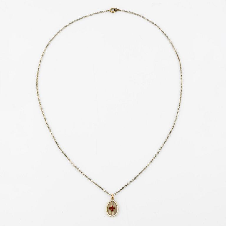 An enamel gold Red cross pendant by Fabergé.