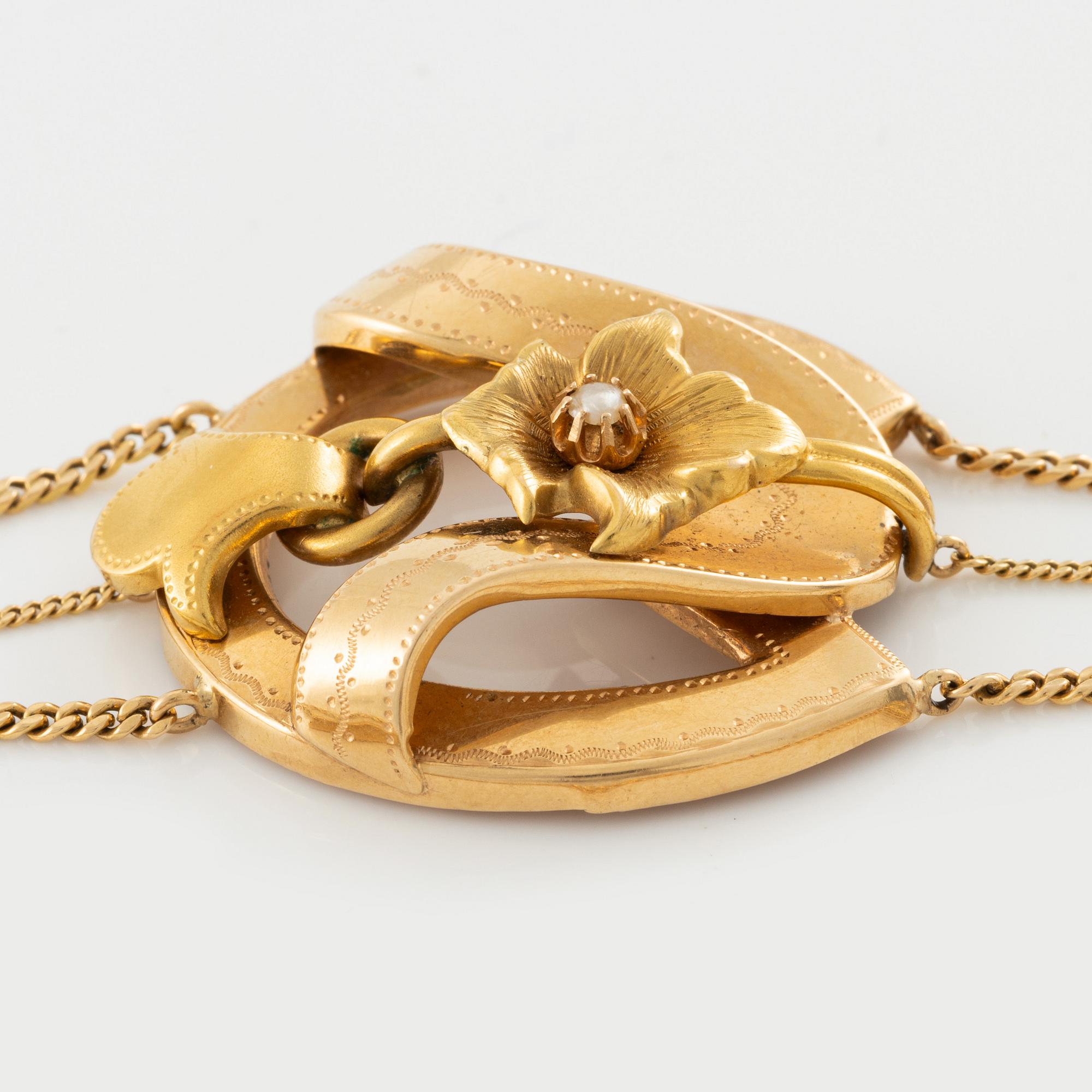 Bracelet 18K gold and a pearl.